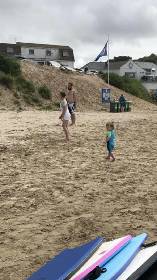 Russell, Kaitlyn and George on the beach Polzeath May 2017.png